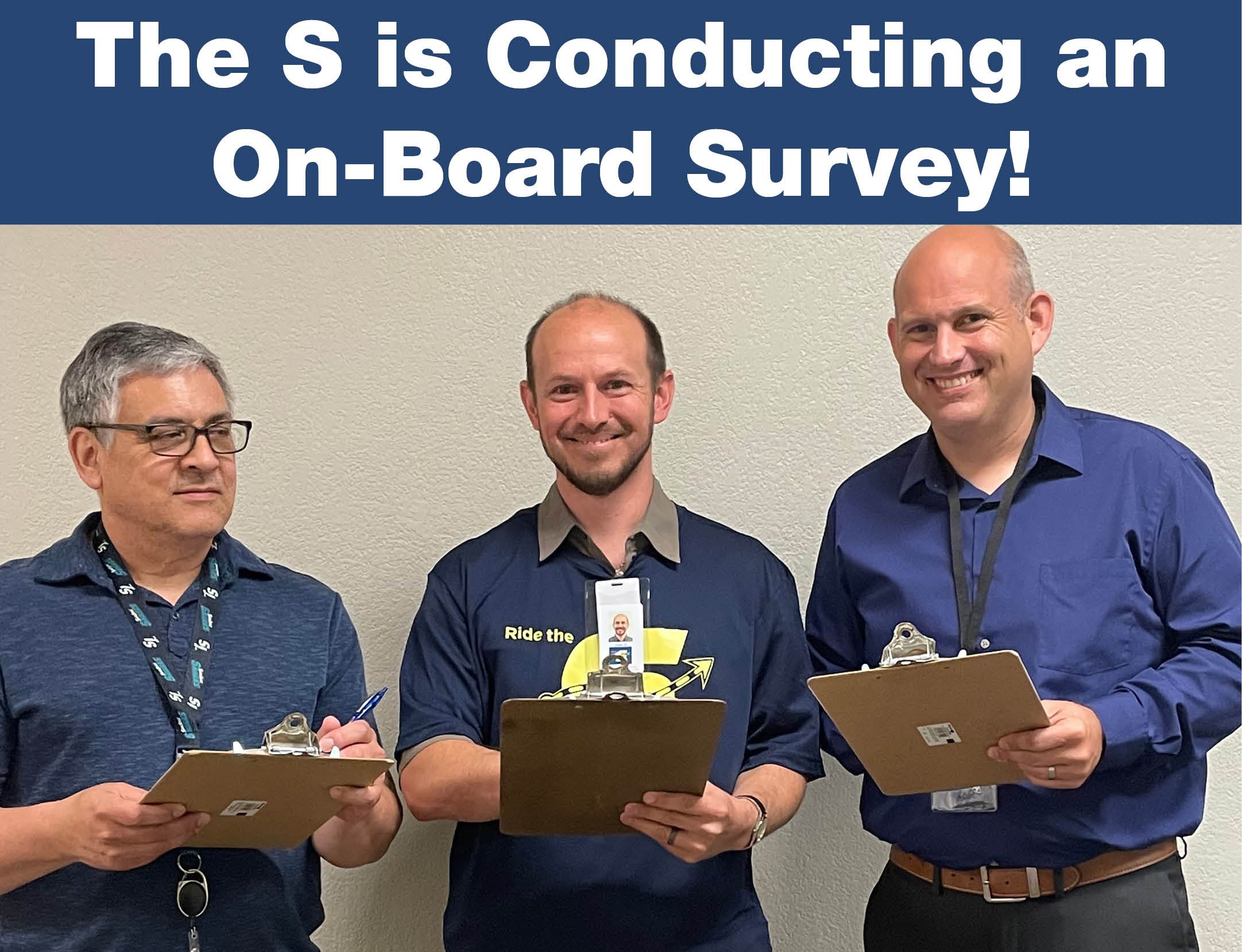 The S is conducting an on-board survey. Image of The S survey takers.