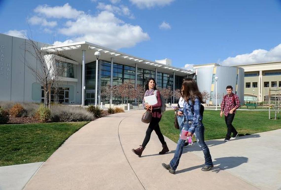 Image of 3 students walking on MJC campus