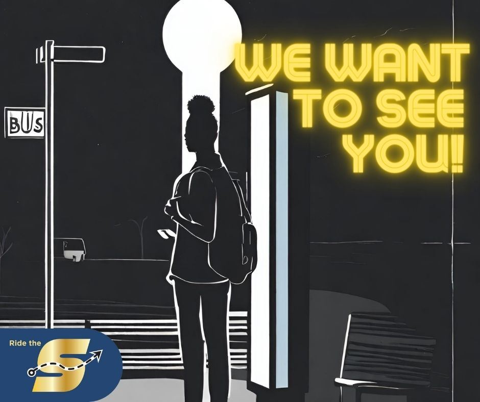 We want to see you, black/white image of a person standing at a bus stop
