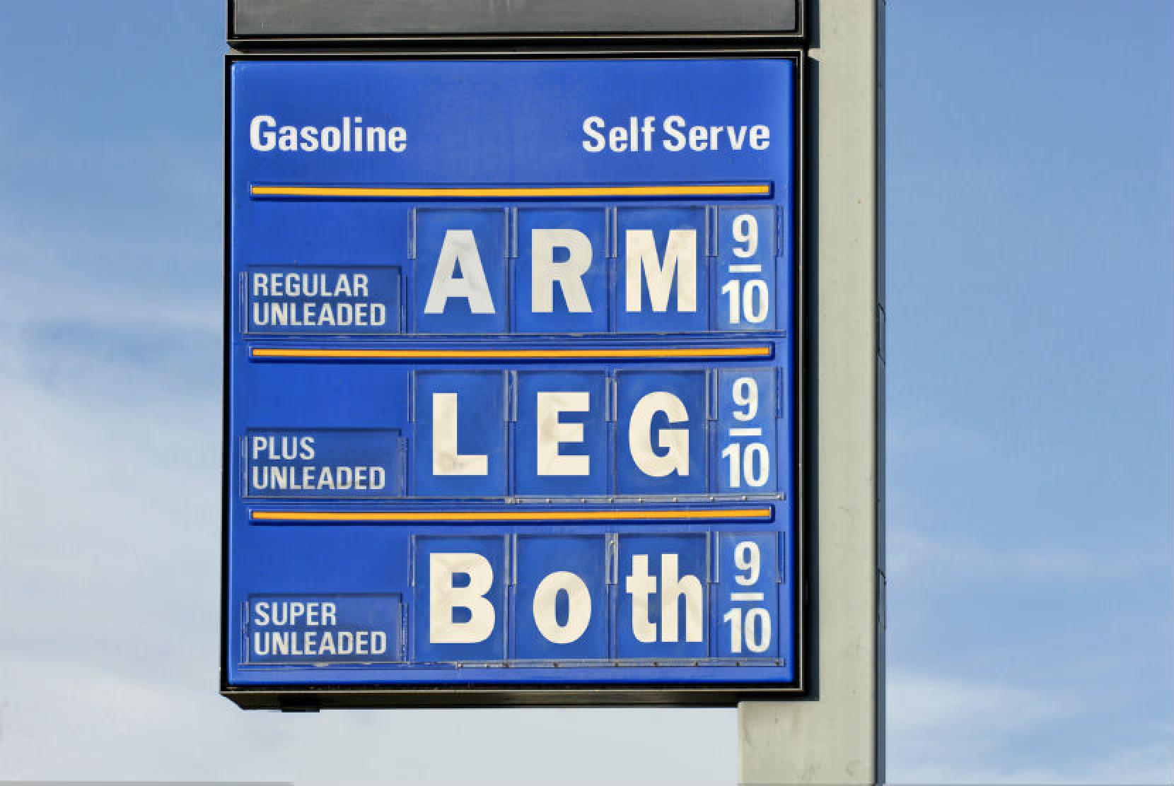 Gas station sign listing prices as arm for regular, leg for plus unleaded, both for super unleaded
