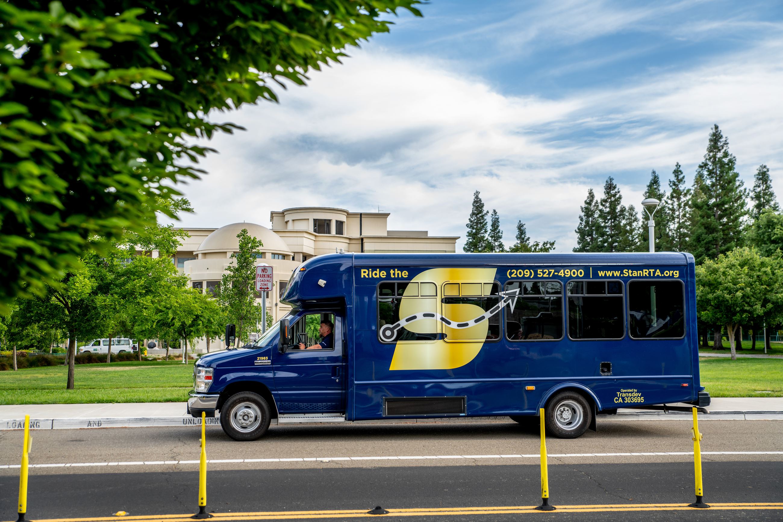 Image of The S bus on street in front of MJC